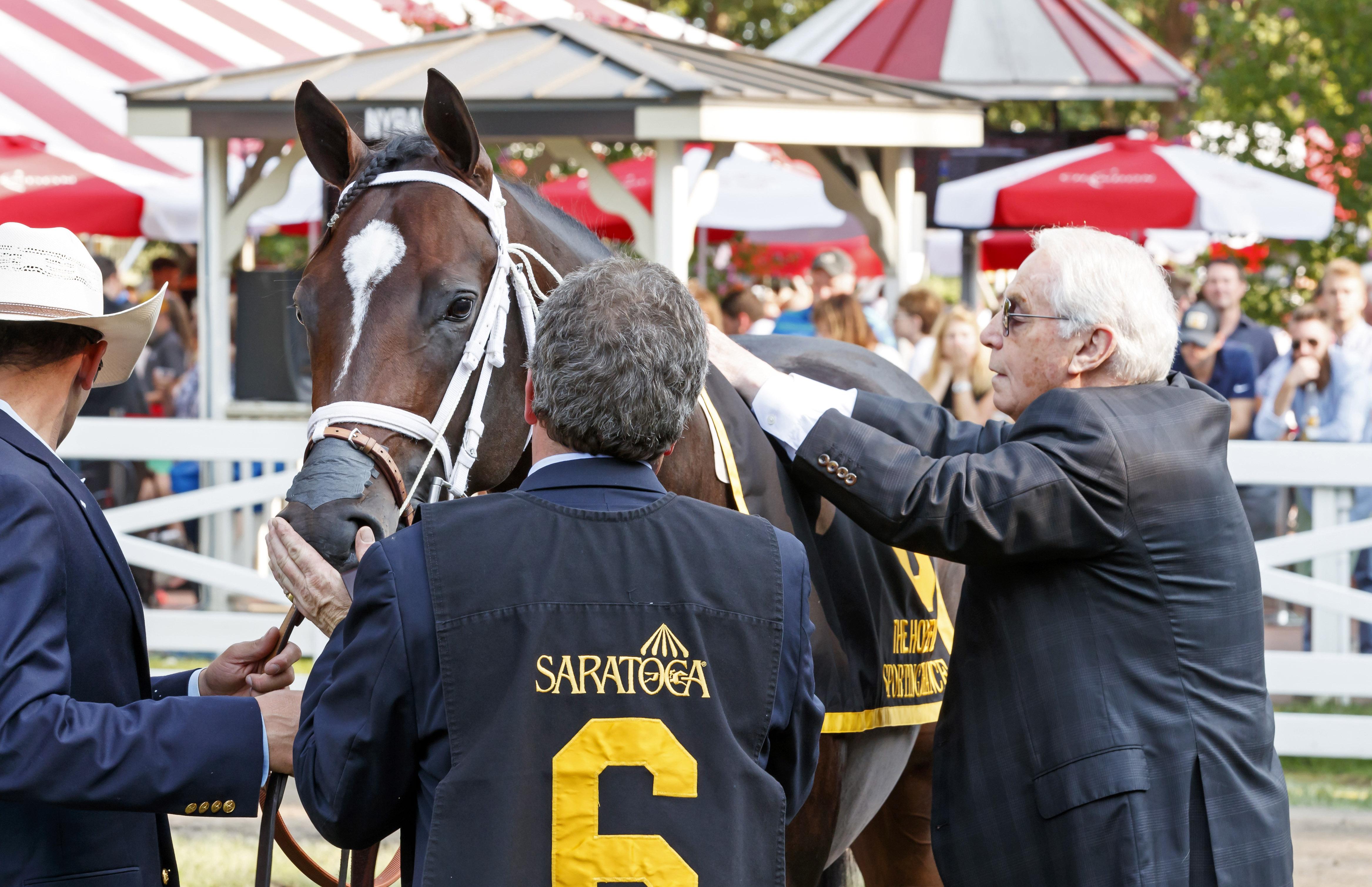 Lukas saddles Sporting Chance before his Hopeful Stakes win. (Eclipse Sportswire) Lukas saddles Sporting Chance before his Hopeful Stakes win.