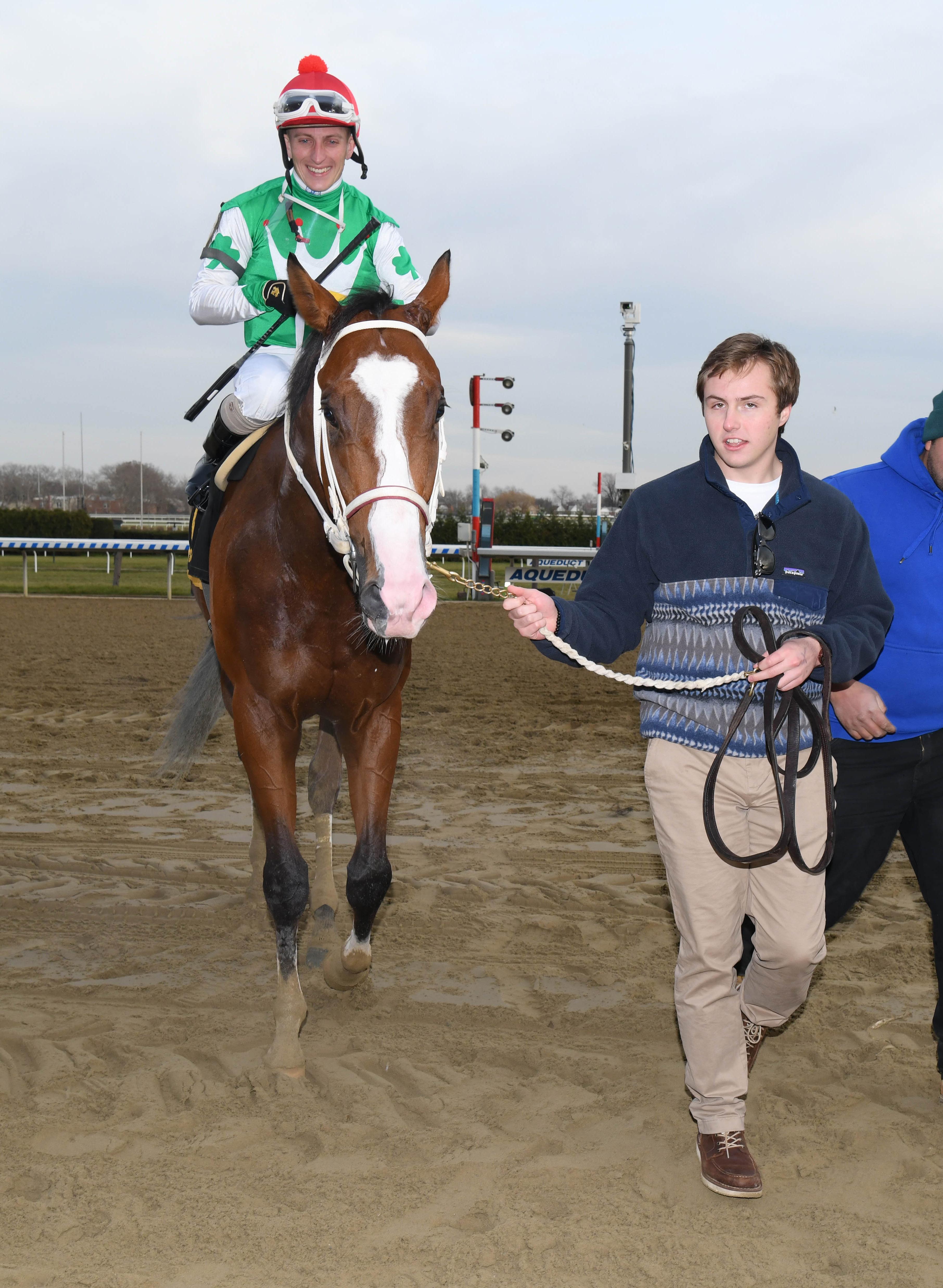 Zacney leads Maximus Mischief into the Remsen winner's circle.