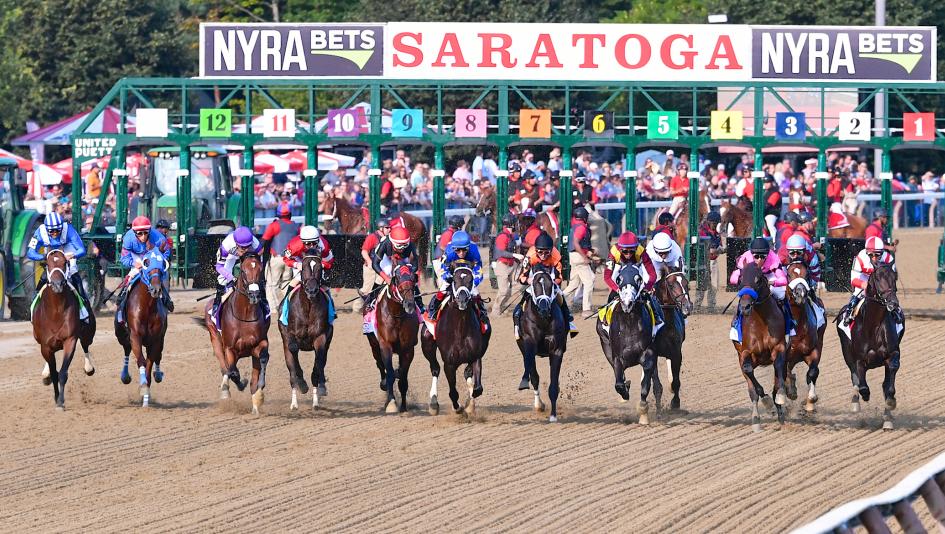 The Field For 2017 Travers Stakes Breaks From Gate With Eventual Winner West Coast Third Right Pink Jockey Silks Taking An Early Lead