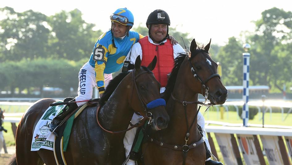 NYRA outrider Miguel Gutierrez escorted both American Pharoah and Justify to the winner's circle after their Triple Crown victories.