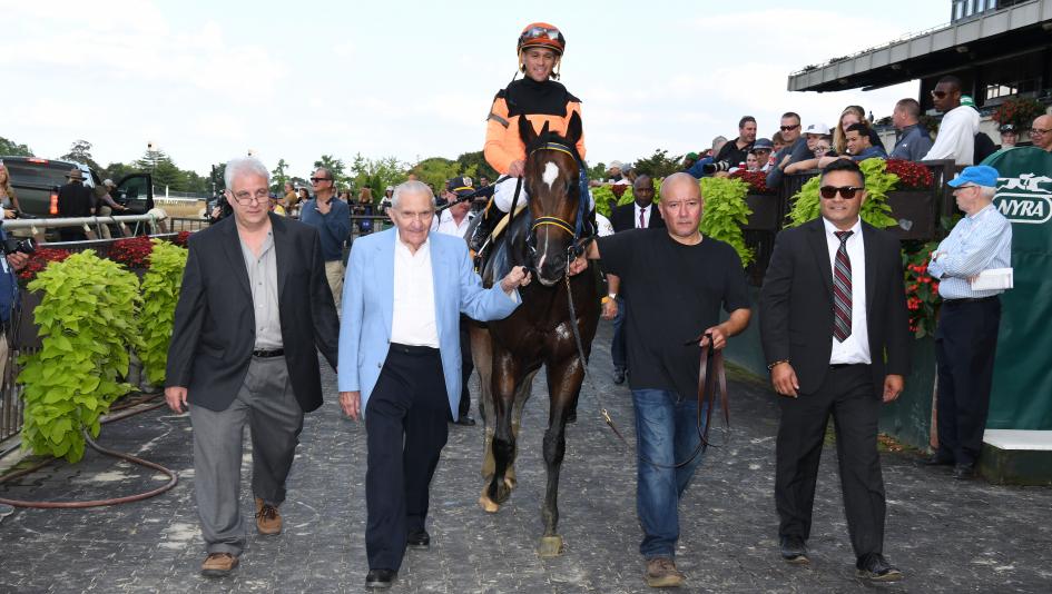 Imperial Hint is a once-in-a-lifetime horse for owner Ray Mamone (second from left) and trainer Luis Carvajal (far right).