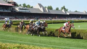 Horses race on the Saratoga turf.