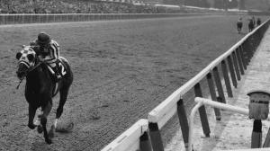 Secretariat wins the 1973 Belmont Stakes in an iconic performance.