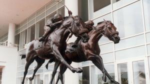 Arlington Million statue donation National Museum of Racing Hall of Fame Churchill Downs Arlington Park Richard Duchossois Bill Carstanjen John Henry The Bart Ronald McAnally Bill Shoemaker Edwin Bogucki collection history 